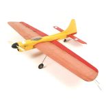 A single engine wooden tether plane.