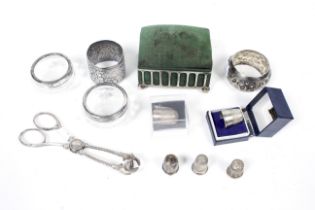 A group of silver and white metal collectables including a jewellery box, napkin rings,