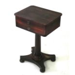 A Regency period mahogany sewing table.