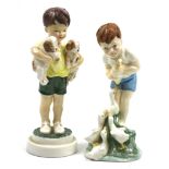 Two Royal Worcester figures of boys by FG Doughty.