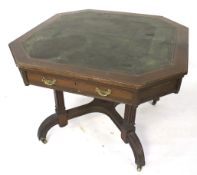 A stamped 'Maple & Co' mahogany inset leather top octagonal table.
