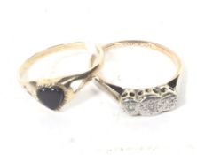 A mid-20th century gold and small eight-cut diamond three stone ring, stamped '18ct & Plat', size L,