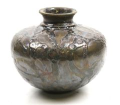 A Studio Art pottery squat baluster vase. With silvered relief decoration to body, H11cm x diam 12.