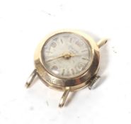 Onyx, a lady's Swiss 18ct gold round wrist watch, circa 1970,