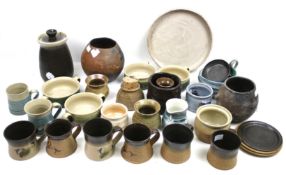 Collection of assorted studio pottery items. Including storage jars, cups, etc. Max.