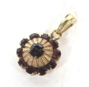 A Vintage Italian gold and garnet cluster pendant.