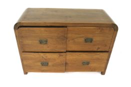 A contemporary oriental style chest of four drawers. With rounded ends on squrare supports.