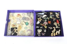 A collection of approximately 30 costume brooches mostly on a naturalistic theme.