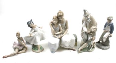 A collection of five Lladro porcelain figures. Including young ballerina and young sailor boy, etc.