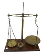 A vintage set of brass W & T Avery Ltd balance scales.