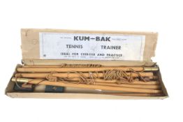A vintage Kum-Bak tennis trainer game by W Horton. 'Rigid post model' In original box.