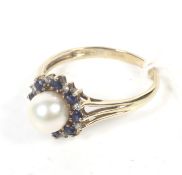 A modern QVC 9ct gold, cultured-pearl, sapphire and diamond cluster ring. The 6.