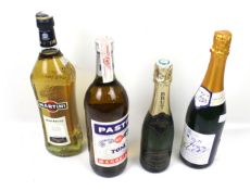 Four bottles of alcohol. Comprising Pastis 'Toni' Marseille 100cl, Bianco Martini 100cl, etc.