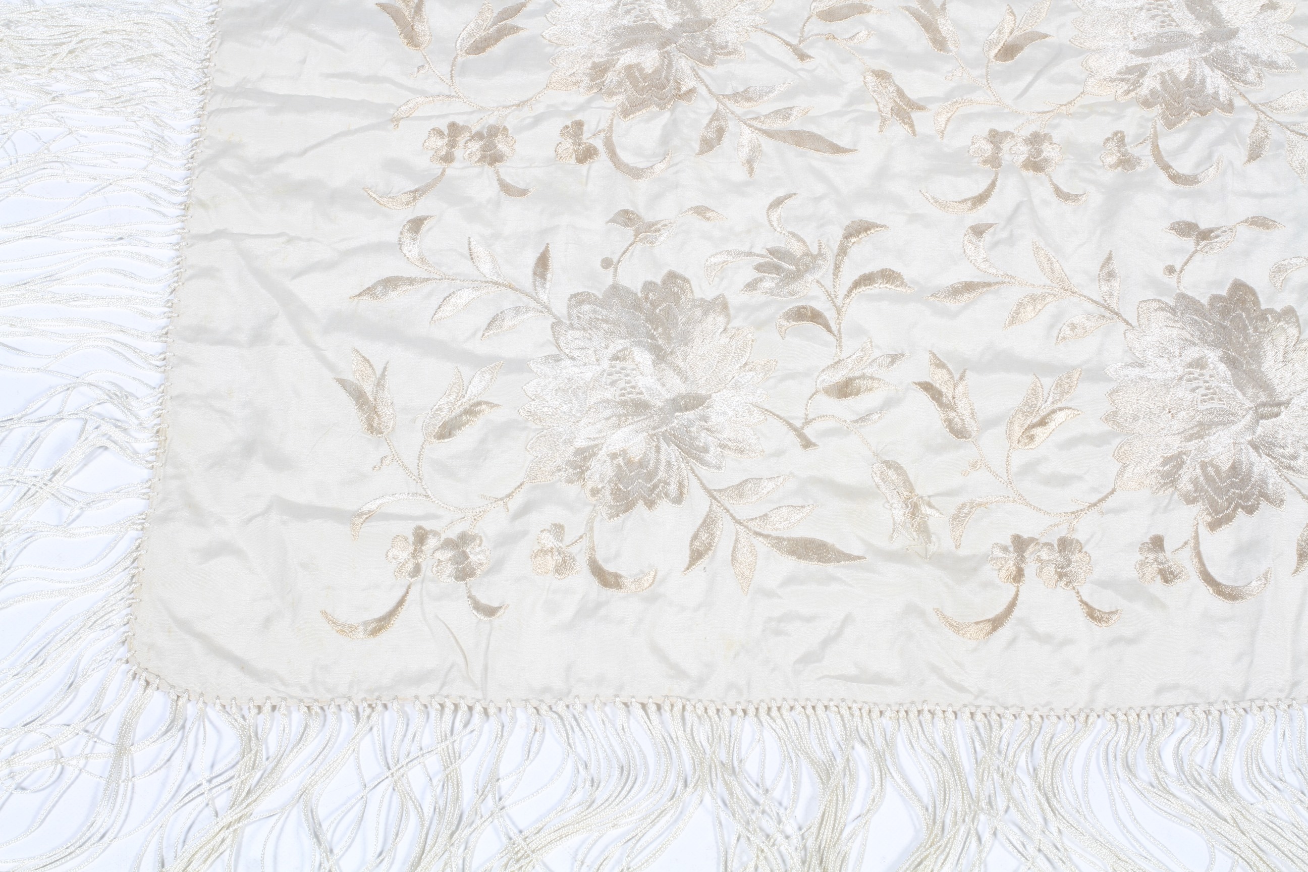 A 20th century cream silk embroidered shawl. - Image 2 of 2