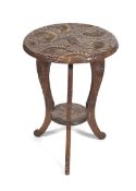 A Liberty, circa 1900 relief carved Sunflower circular table.