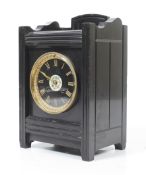 A 19th century black slate mantel clock.