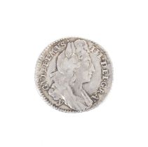 A 1696 York sixpence coin. Lightly cleaned.