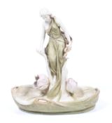 A Royal Dux Art Nouveau figural dish.