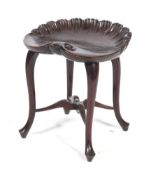 An Edwards & Roberts stained wood grotto stool.