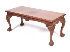 A late 20th century mahogany coffee table.