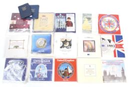 A collection of fifteen assorted British Brilliant Uncirculated coin sets.