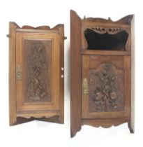 Two similar Victorian walnut hanging corner cabinets.