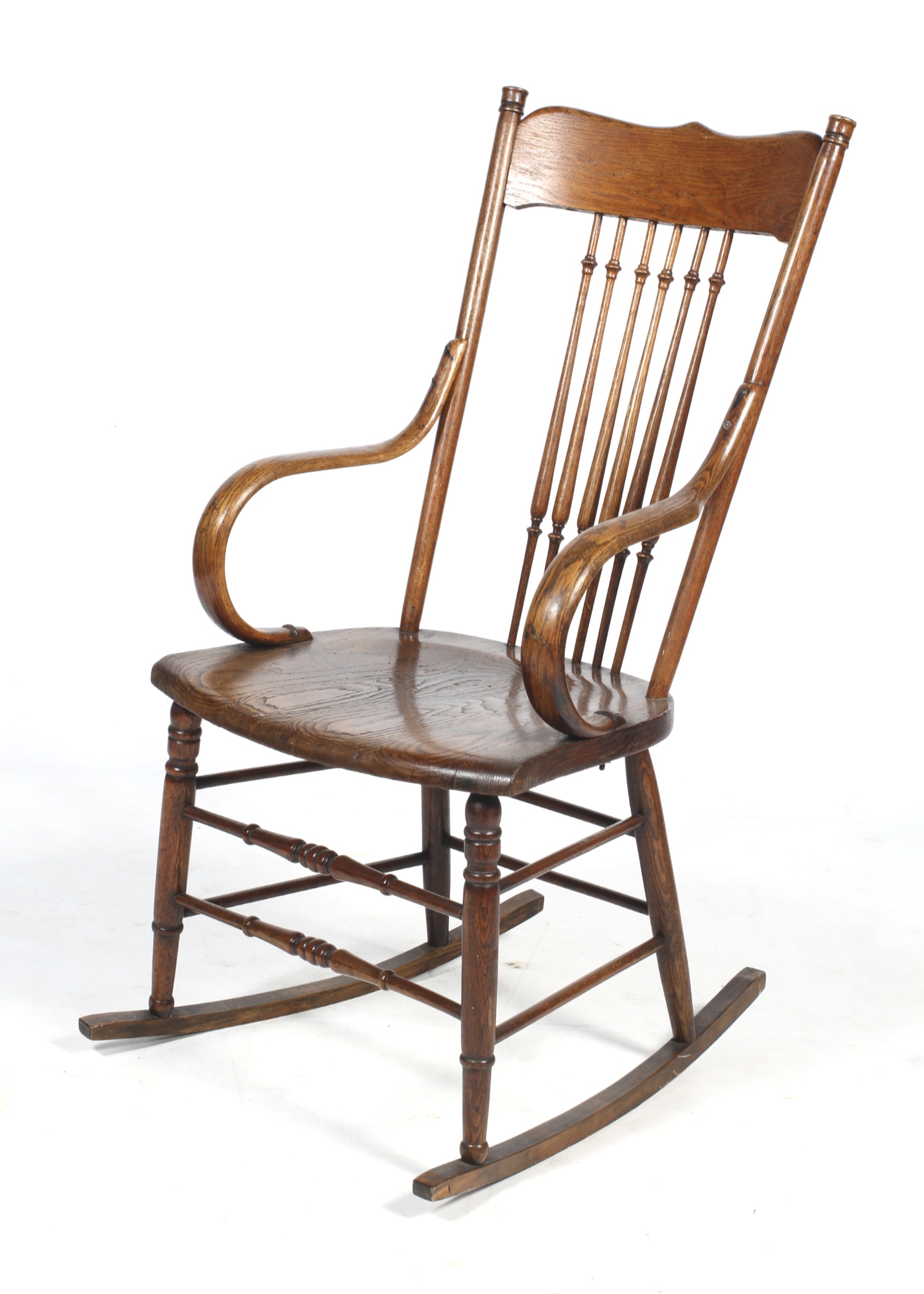 A circa 1900 American oak rocking chair.