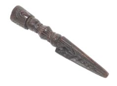 An early 20th century carved tri-form wooden dagger. The handle featuring human heads, L26.