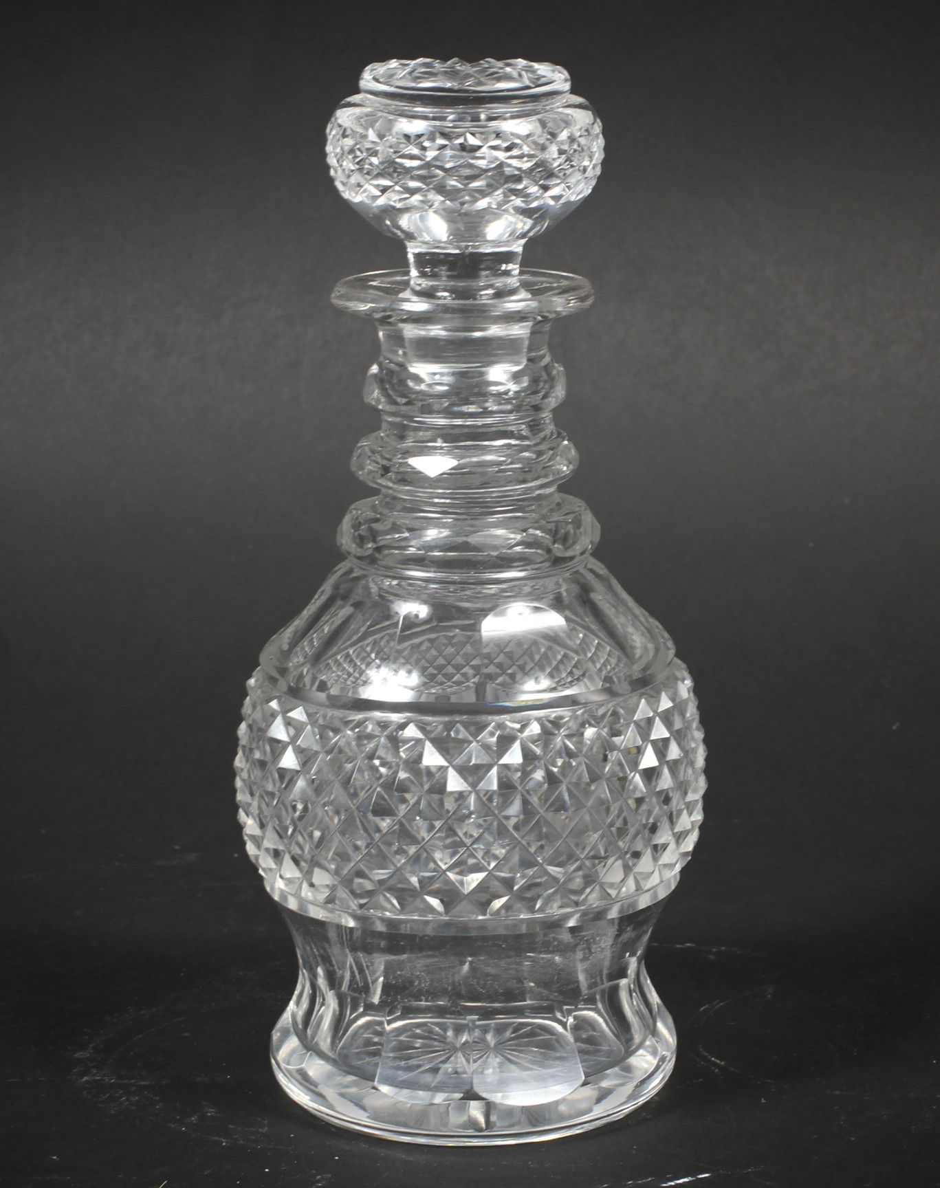 A Regency glass decanter.