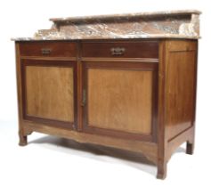 A circa 1900 French Art Nouveau mahogany sideboard/washstand.