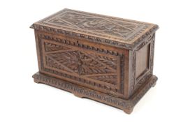 A Victorian carved oak stationary box.