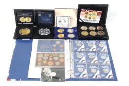 A group of modern coin sets.