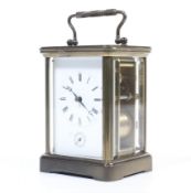 A French carriage clock with an alarm.