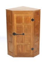 Circa 1970, workshop of Robert 'Mouseman' Thompson (Kilburn), oak hanging corner cupboard.