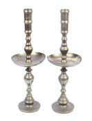 A pair of large 19th century candlesticks.