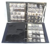 Two ring binder albums of 20th Century coins. Including some silver, mainly Elizabeth II.