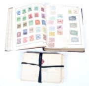 A collection of stamps and covers including King George VI First Day covers.