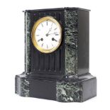 A slate and marble cased 8-day mantel clock. Movement marked ROLLIN A PARIS. With key. H32.