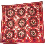 A 20th century Suzani embroidered decorative wall hanging.