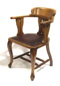Liberty style Art Nouveau blonde oak armchair with pierced back and side splats with twin