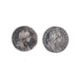 Two sixpence coins: A 1697 Chester mint and 1696 Exeter.