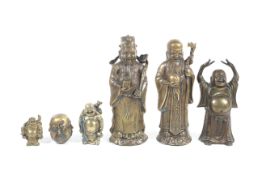 Six brass oriental figures.