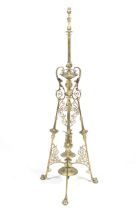 A 19th century ornate brass standard lamp.