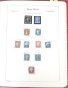 An album of Great Britain stamps and a bundle of circulated Raflet Great Britains books.
