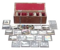 A collection of 20th century glass projector slides.