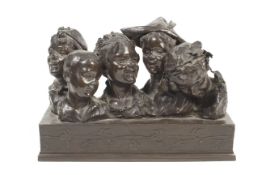 A cast metal patined sculpture 'Peter Pan, Wendy & boys'.