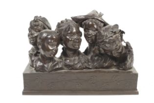 A cast metal patined sculpture 'Peter Pan, Wendy & boys'.