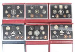 Six proof sets of coins.