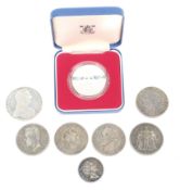 Group of eight silver coins.