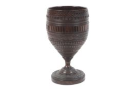 An 18/19thC treen 'Coconut' style cup.